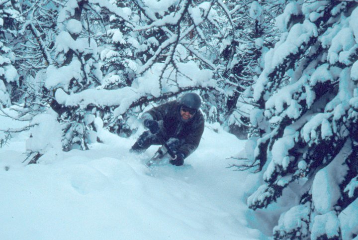 Ian Watson shooting a gap in the trees. Lake Louise, Alberta. December, 1990.
