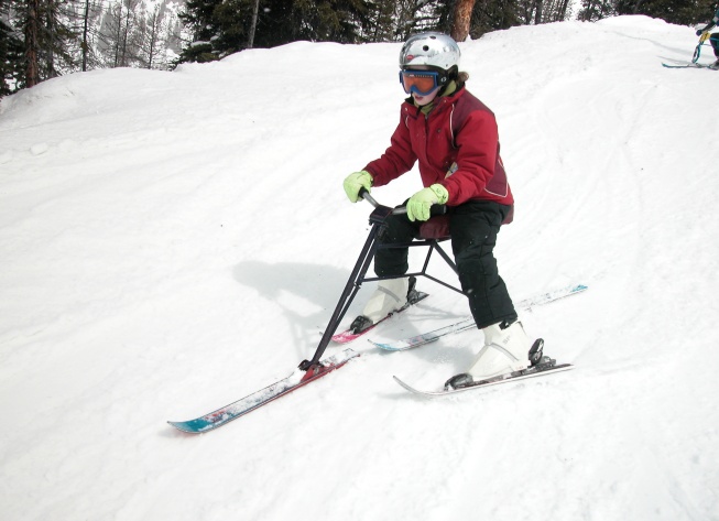 Alexis, easily spotted with those green gloves and shiny helmet! <br />Lake Louise, Alberta. April, 2003.